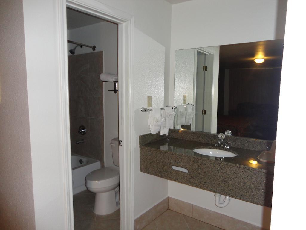 Garden Inn And Suites Silsbee Rum bild