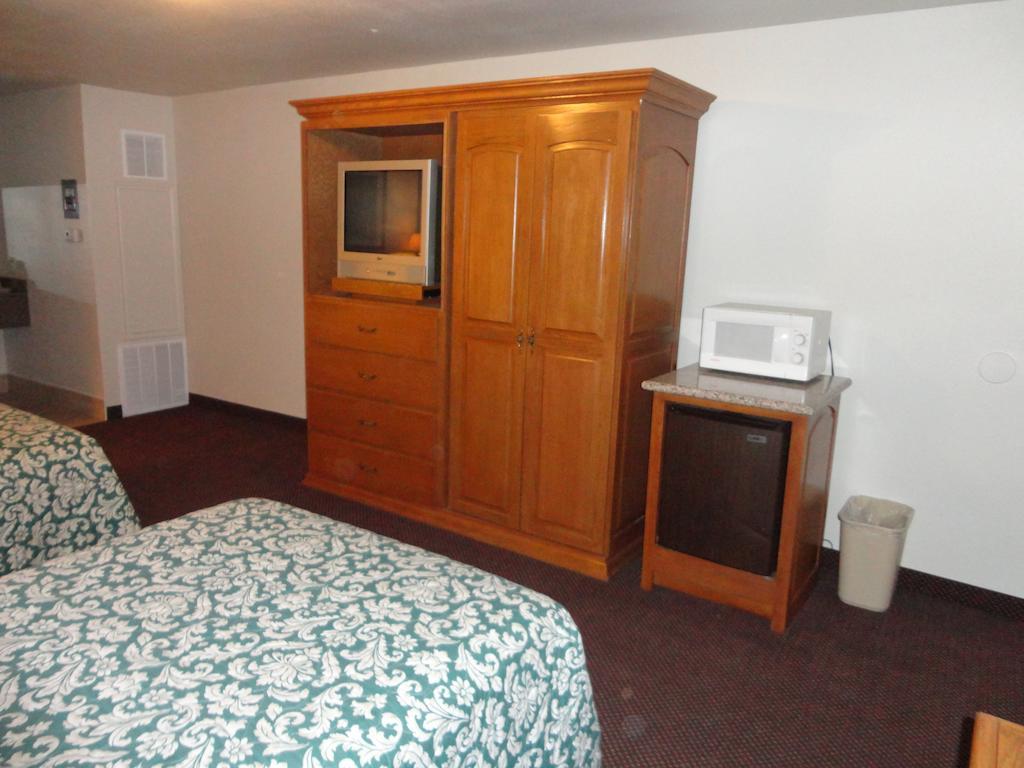 Garden Inn And Suites Silsbee Rum bild